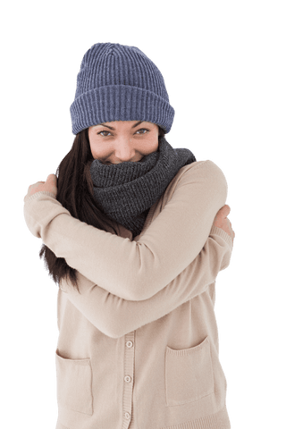 Brunette woman embracing warmth with winter clothes transparent