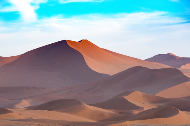 Majestic Dunes Under Bright Blue Sky in Desert Landscape - Download Free Stock Photos Pikwizard.com