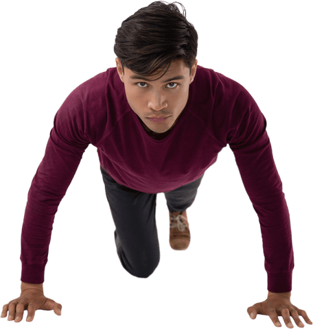 transparent man kneeling with focused expression and burgundy sweater - Download Free Stock Videos Pikwizard.com