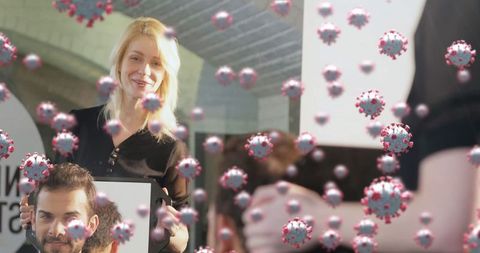 Woman Holding Signperson Raising COVID-19 Issue Amid Virus Representation