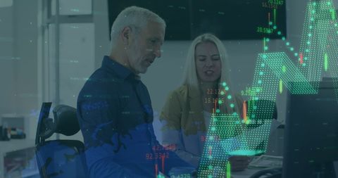Colleagues analyzing data on digital interface in modern office
