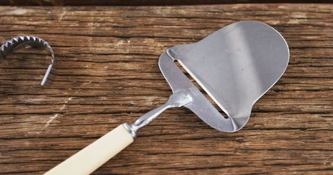 Cheese Slicer and Corkscrew on Rustic Wooden Surface - Download Free Stock Images Pikwizard.com