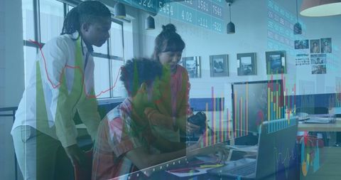 Team Analyzing Data on Digital Interface in Modern Office