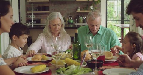 Multigenerational Family Dining Together at Home - Download Free Stock Images Pikwizard.com
