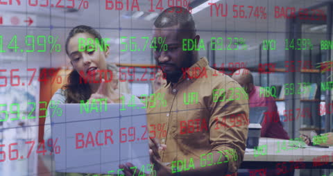 Diverse Colleagues Collaborating in Tech-Driven Office