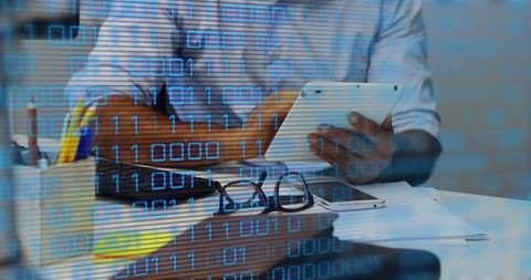 businessman working on tablet with binary data overlay - Download Free Stock Images Pikwizard.com