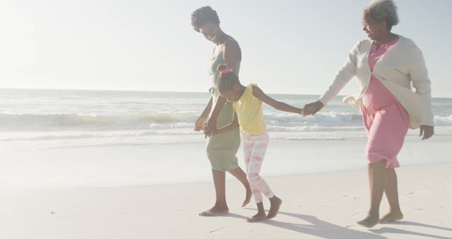 Three Generations of Women Walking on Beach at Sunset - Download Free Stock Images Pikwizard.com