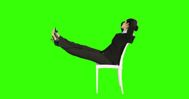 Businesswoman Relaxing with Feet on Chair, Green Screen Background - Download Free Stock Images Pikwizard.com