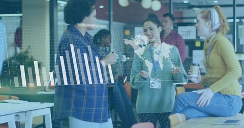 Businesswomen Analyzing Financial Data with Global Interface