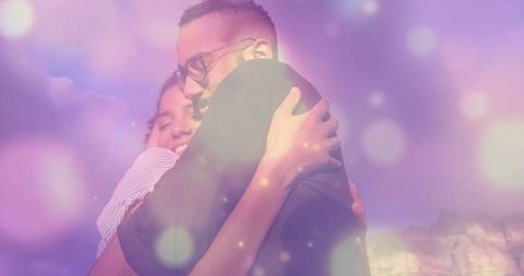 Romantic Couple Embracing Under Pastel Sky