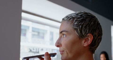Caucasian Businesswoman Using Smartphone for Communication - Download Free Stock Images Pikwizard.com