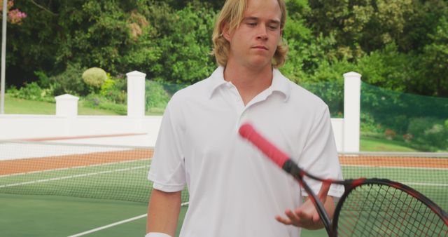 Young Male Tennis Player Flipping Racket During Match Outdoors - Download Free Stock Images Pikwizard.com