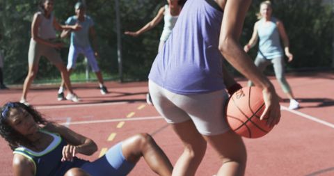 Women Enjoying Competitive Basketball Outdoor Team Sports