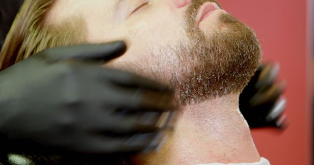 Bearded Man Receiving Professional Facial Massage at Barbershop - Download Free Stock Images Pikwizard.com