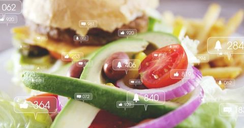 Displaying fresh avocado salad with cherry tomato and social media engagement bubbles