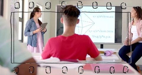 Student presenter using tablet showing geometry diagram on screen while classmates watch