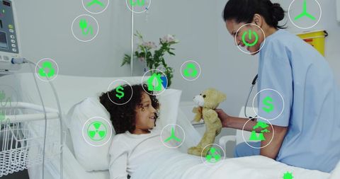 Nurse Spreading Joy to Hospitalized Child with Teddy Bear