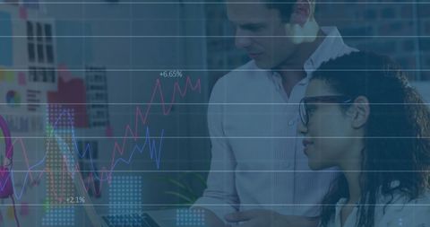 diverse professionals analyzing digital financial graphs in modern office - Download Free Stock Images Pikwizard.com