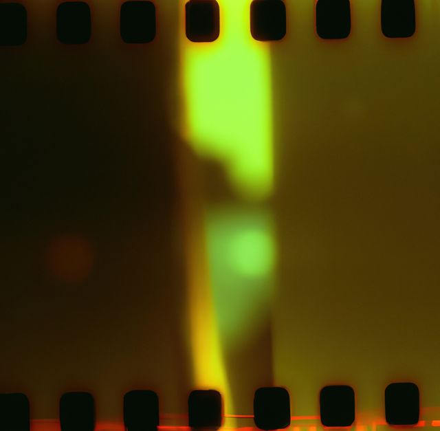 Image of close up of green film light leak overlay. Light, camera, film and photography concept.