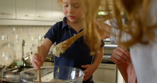 Young Children Learning to Cook Together in Modern Kitchen - Download Free Stock Images Pikwizard.com