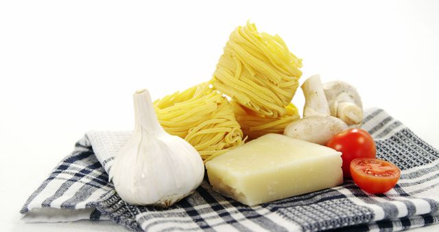 Fresh Ingredients for Italian Pasta Dish on Kitchen Towel - Download Free Stock Images Pikwizard.com