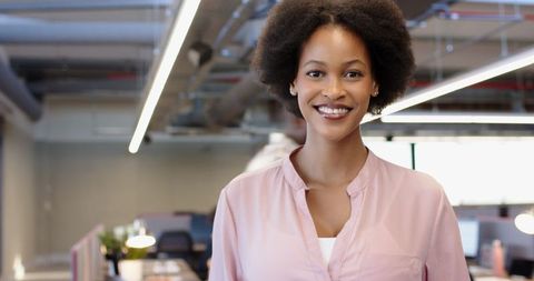 Confident female entrepreneur in modern office
