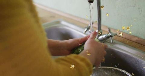 Washing Fresh Vegetables in Rustic Kitchen Setting