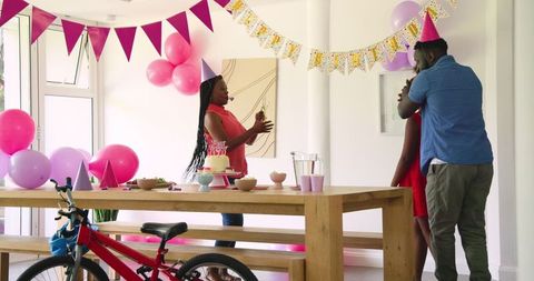 Loving Father Celebrates Daughter's Birthday at Home