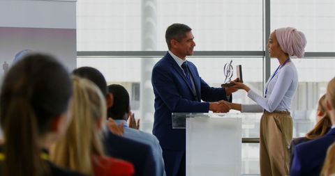 Diverse business seminar award ceremony with applause