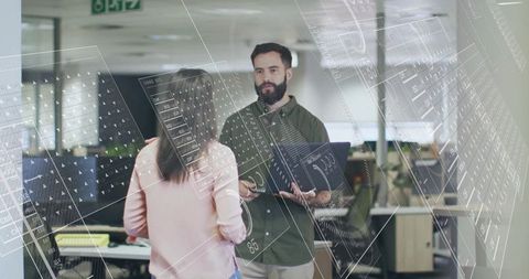 Innovative office professionals collaborating with technological overlays