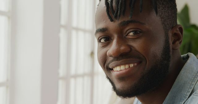 Smiling Young African American Man Posing Indoors - Download Free Stock Images Pikwizard.com