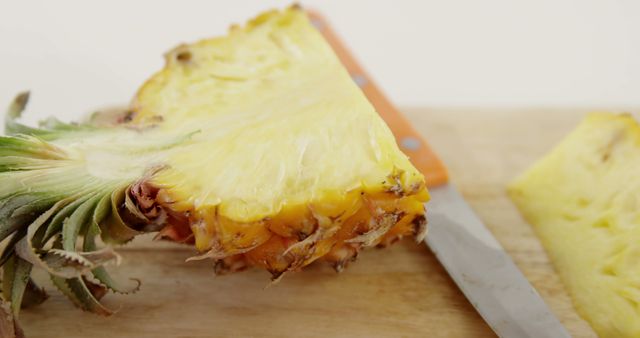 Closeup of Fresh Pineapple Slice on Wooden Cutting Board - Download Free Stock Images Pikwizard.com
