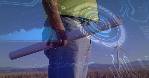 Engineer Holding Blueprint with Futuristic HUD Over Wind Farm