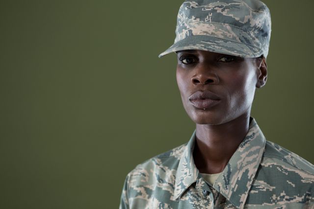 Portrait of androgynous man in camouflage uniform