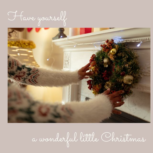 Hands Decorating Christmas Wreath Over Classic Fireplace - Download Free Stock Templates Pikwizard.com