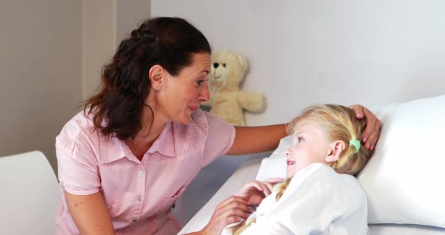 Caring Mother Comforting Sick Daughter in Hospital Bed - Download Free Stock Images Pikwizard.com