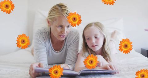 Mother and Daughter Bonding While Reading in Cozy Bed