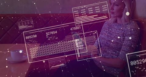 Woman Engaging with Digital Bytecode Interface in Modern Cafe Environment