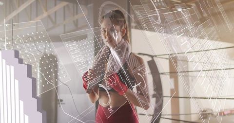 Female boxer training in industrial ring with futuristic hud overlays and sports analytics