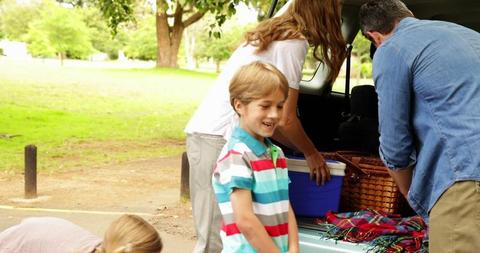 Family Preparing for Picnic in Park with Happy Children - Download Free Stock Images Pikwizard.com