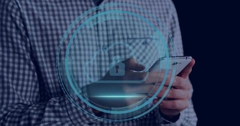 Securing mobile cloud access: man holding smartphone with holographic lock interface