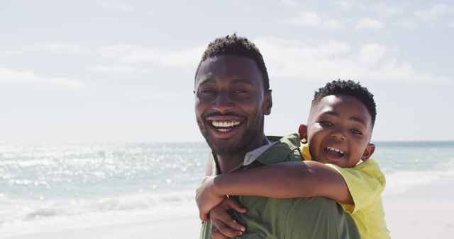 Happy Father and Son Enjoying Day at Beach - Download Free Stock Images Pikwizard.com