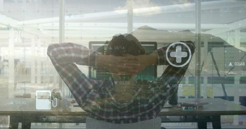 Caucasian Businessman Analyzing Digital Stock Market Data in Office with Holographic Interface