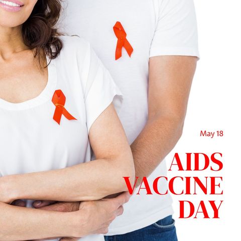 Couple Supporting AIDS Vaccine Day with Red Ribbons