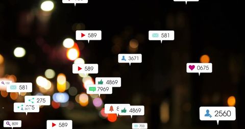 Digital networking icons over busy city background