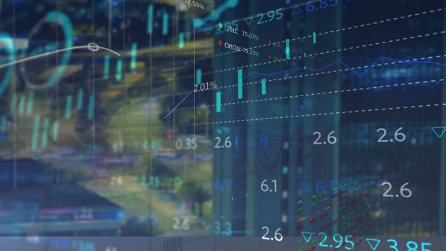 Displays an overlay of stock market data on a city's traffic. Suggests a blend of technology and economy suitable for illustrating concepts in financial analysis, market reports, or innovation in urban settings. Ideal for use in presentations about economic trends or technological impact on finance.