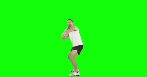Male Athlete Practicing Shot Put with Green Background