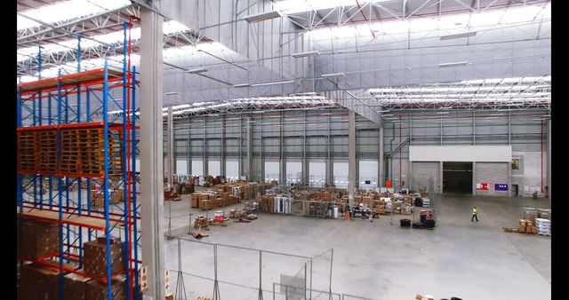 Large Industrial Warehouse with High Shelving and Stacked Boxes - Download Free Stock Images Pikwizard.com