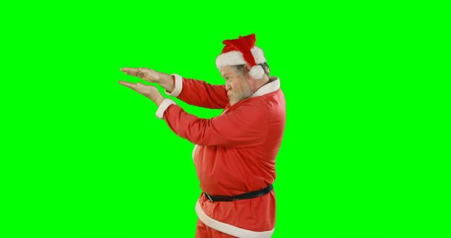 Santa Claus Performing Imaginary Spell on Isolated Green Screen - Download Free Stock Images Pikwizard.com