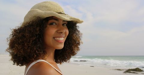 Smiling Woman in Sun Hat Enjoying Beach Day - Download Free Stock Images Pikwizard.com